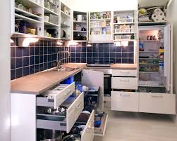 So choosing the right style, colour, and finish will be a crucial for minimal spaces, choose white or grey doors for your kitchen cabinets. File White Kitchen With Cabinet Doors And Drawers Opened Or Removed So That Real Life Stuff Can Be Seen In Cabinets Jpg Wikimedia Commons
