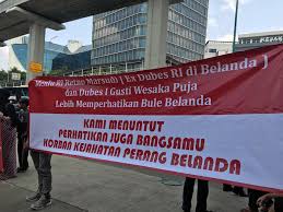 Where did the sentence rugi come from bab.la? Banners Protest Against Dutch Royal State Visit Histori Bersama
