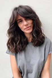 Adding a bang is a great way to create a 'new' style without the commitment of a drastic haircut or length change. Curtain Bangs Are A New Breath Taking Trend Circling Among Devoted Fashionistas