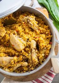 Arroz con gandules is one of puerto rico's signature rice dishes. Arroz Con Pollo How To Make Puerto Rican Style Chicken And Rice