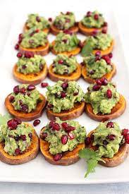 Holiday Pomegranate Guacamole Fitliving Eats By Carly Paige Recipe Christmas Recipes Appetizers Appetizer Recipes Toast Recipes