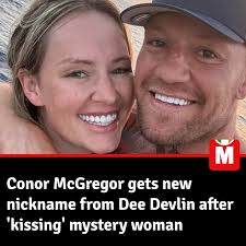 Dee Devlin appears to be supporting Conor McGregor despite him kissing a  mystery woman Full story below