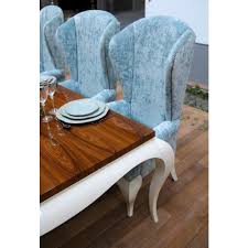 Featuring a curved high back, plush cushioned seat and deeply tufted velvet upholstery studded with nailheads, this dining chair is sure to take your dining experience to a. Duck Egg Blue Shimmer Velvet High Back Tall Grand Dining Chair