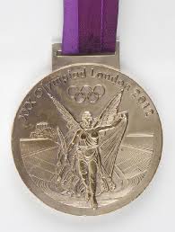 Competing to movie themes including live and let die, dujardin and her horse valegro won great britain's first individual dressage gold medal with a score of 90.089 points to put. Mysterious London 2012 Olympic Gold Medal Tops 50 000 At Auction