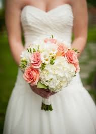 The gerbera is a perfect choice to brighten up the mood and bring a cheerful feel to any reception. Creatively Country August Wedding Flowers Coral Wedding Flowers Wedding Flowers