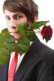 Young Man with Rose in His Teeth Isolated Stock Image