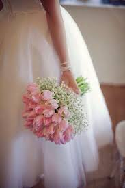 Tulips And Baby S Breath Make A Stunning Bouquet Romantic Wedding Flowers Tulip Wedding Pink Bouquet