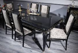 For a timeless look in the dining room, furnish the space with a black dining table. Casa Padrino Luxury Baroque Dining Table Black Gold Handcrafted Solid Wood Dining Room Table Baroque Dining Room Furniture Noble Magnificent