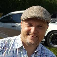 McLaren team transporter outside the shop.