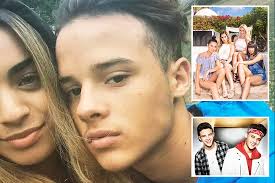 Axed X Factor hopeful Kyle Brooks snuggles up to Four of Diamonds’ Caroline