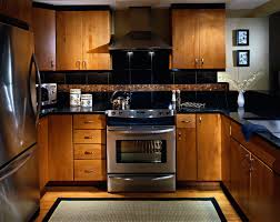 Condo Kitchen With Asian Feel Slab Maple Cabinet Doors Absolute Black Granite Slab Counters Bis Kitchen Remodel Design Kitchen Remodel Kitchen Design Decor