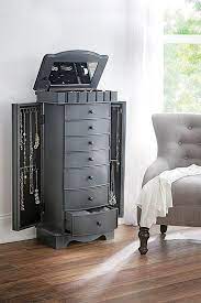 Typically, they have a number of while a jewelry armoire is generally narrower than a nightstand and smaller than a standard chest of. 25 Beautiful Large Jewelry Armoires Zen Merchandiser Standing Jewelry Armoire Jewelry Armoire Makeover Painted Jewelry Armoire