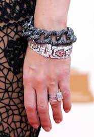 A Tattoo On His Hand Gwyneth Paltrow S Engagement Ring From Chris Martin Can Be Seen At T Celebrity Engagement Rings Engagement Rings Jewelry Rings Engagement