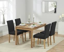 Update your dining room with this seasons on trend grey dining collections. Arnold Solid Oak 120cm Dining Table With 4 Dark Grey Black Maiya Chairs Designer Sofas4u