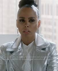 WornOnTV: Teagan's ruffle blouse and silver metallic coat