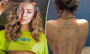 Some fans are even convinced that drake got a tattoo in honour of smith. Tatt S Amazing Imogen Anthony Shows Off Her New Back Tattoo And Reveals Its Hidden Meaning Daily Mail Online