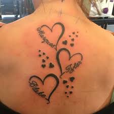 Our kids are our heart, and what a beautiful way to honor that bond than with a name tattoo in a great script with a heartbeat line. Chest Female Kids Name Tattoos Novocom Top
