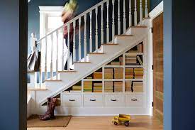 12 Creative Ways To Use The Space Under Your Stairs Staircase Shelves Stair Storage Stairs Design