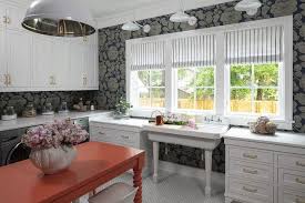 Style laundry room folding tablehome design idease. White Laundry Room Cabinets With Red Island Transitional Laundry Room