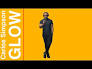 Glow by Carlos Simpson Music. Yellow background with the artist Carlos Simpson posing. 