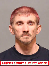 BOOKING PHOTO: 33-year-old Christopher Thomas Wiggins remains in custody of  the Larimer County Sheriff's office (Colorado) after Wiggins was charged  with kidnapping a 13-year-old girl. This stems from the AMBER alert issued