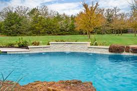 We offer pool design, sell hot tubs build patios, pergolas. Freeform Pool Water Feature Sun Shelf Fire Pit And Pergola Swimming Pool Other By Paradise Oasis Pools Houzz