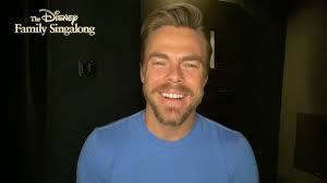 Derek Hough talks about performing with his girlfriend and sister in 'The  Disney Family Singalong'