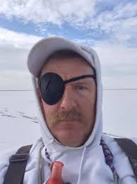 Shooting with both eyes open for accuracy