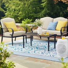 It features a polyester/latex backing that holds it in this outdoor area rug is available in several color schemes, including multicolor, blue, natural, and gray. Types Of Outdoor Rugs The Home Depot