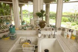 kitchen sink in corner with windows