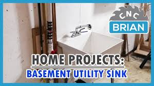When it senses water entering the sink, it turns itself on and pumps the water out. Home Projects How To Install A Basement Utility Laundry Sink Youtube