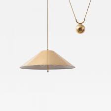 For pendant lights installed above a dining table or countertop, typical hanging height is approximately 24 inches to 30 inches. Chinese Hat Brass And Counter Weight Pendant Lamp