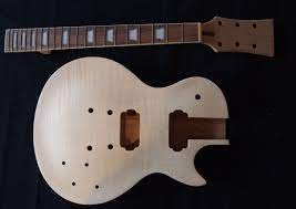 This is a double cutaway style guitar with 2 humbuckers, 2 volume and 2 tone. Les Paul Diy Kit