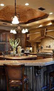 Gallery of tuscan kitchen ideas including a variety of cabinet styles, flooring, islands & decor. Find More Ideas Rustic Tuscany Kitchen Decor French Country Kitchen Cabinets Rustic Tuscan Kitche Tuscan Kitchen Design Tuscany Kitchen Italian Kitchen Design