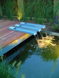 Depending where you live, choices might include tropical water lilies, papyrus, ferns, and hostas. Top 70 Best Backyard Waterfalls Water Feature Design Ideas
