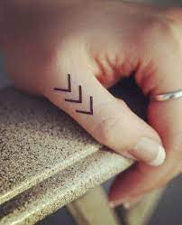 65 Cute And Inspirational Small Tattoos Their Meanings You Will Definitely Love Cute Finger Tattoos Chevron Tattoo Tattoos
