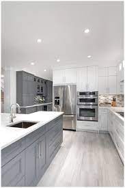 Modern White Gray Kitchen Bright Modern Gray White Kitchen Gray Cabinets White Cabinets Grey Kitchen Floor White Kitchen Design Grey Kitchen Designs