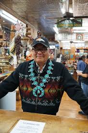 Ernest Roy Begay showing off his cluster necklace