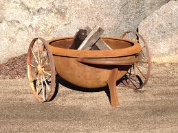 Using wheelbarrow as fire pit. The Fire Pit Gallery Wood Burning Fire Pit Artistic Fire Pits