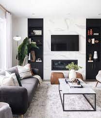 Paint an exposed brick wall white. Warning These 10 Black And White Living Room Ideas Are Downright Intoxicating Hunker Black Living Room White Living Room Black And White Living Room
