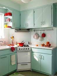 Design a sophisticated kitchen with vintage white kitchen cabinets in minnesota, usa. Retro Kitchen Retro Kitchen Retro Home Decor Kitchen Decor