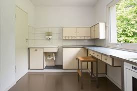 Linoleum is checkerboard, typical of that era. A Brief History Of Kitchen Design From The 1930s To 1940s Apartment Therapy