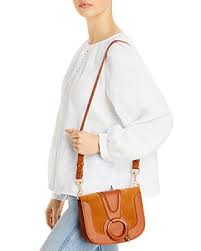 Coach swagger saddle bag silver buckle pebbled leather. Saddle Bag Purses Bloomingdale S
