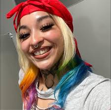 Self taught tattoo artist tries glitter tattoo