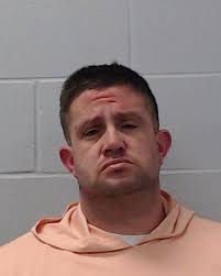 Hendry, Charles Adam was booked into the Hays County Jail