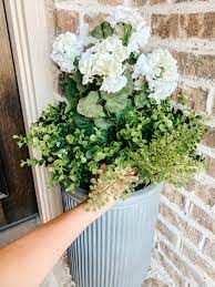 And while it doesn't come with a. How To Fill An Outdoor Planter With Artificial Flowers And Faux Plants