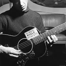 Folk Singer Woody Guthrie Playing Guitar With Sign On It Reading This Machine Kills Fascists Premium Photographic Print Eric Schaal Allposters Com