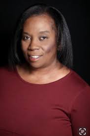 Frieda McKinnon, Real Estate Agent