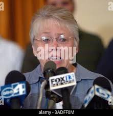 Thelma Soares, mother of Lori Hacking, weeps while family spokesman reads a  letter written by Soares concerning the death of her daughter during a news  conference Monday, Aug. 2, 2004, at the