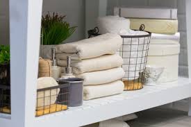 The countertop's curved shape allows the door to open into the small bathroom but still manages to squeeze in more storage. Creative Bathroom Storage Ideas Homelane Blog